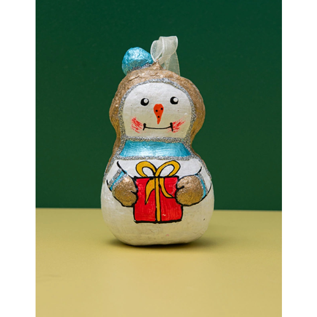 Handmade papier-mache Snowman with a gift