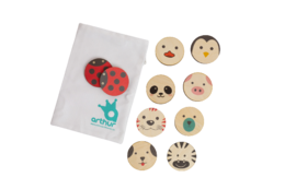 Memory game with 18 cute animal-themed wooden discs in various shapes and colors, including ladybugs, owls, and other designs.