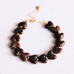 Beaded bracelet of heart-shaped resin XL - brown