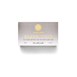 Black, handcrafted African black soap bar with natural ingredients.