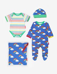 Organic gift set with rainbow applique, includes onesie, hat, and footie pajamas in sizes newborn to 12 months. Features colorful rainbow and cloud patterns.