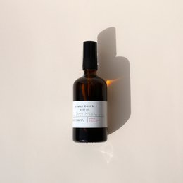 Tonic and Regenerating Body Oil, a nourishing and rejuvenating body oil in a glass bottle.