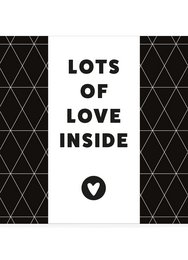 Chocolate bar with a bold "LOTS OF LOVE INSIDE" text and a heart symbol, featuring a unique geometric pattern design.