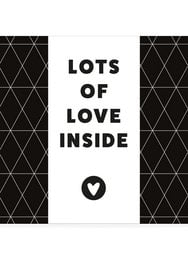 Chocolate bar with a bold "LOTS OF LOVE INSIDE" text and a heart symbol, featuring a unique geometric pattern design.