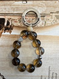  Smoky quartz keychain with round beads in varying shades of brown and gray.
