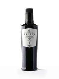 Premium extra virgin olive oil in a 500ml bottle. Dark green glass bottle with black label featuring the Zahara brand name.