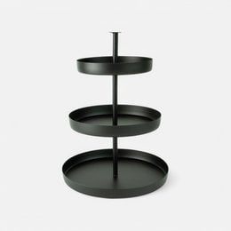 Black metal tiered tray with 3 round levels for storage and display.