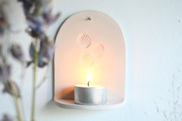 Ceramiczny wieszak ścienny ze świecą