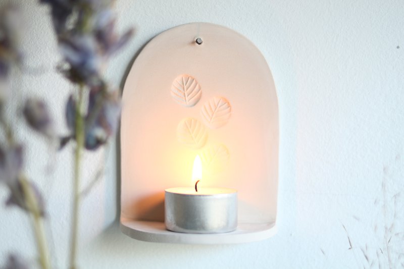 Ceramiczny wieszak ścienny ze świecą