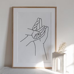'Minimalist line art wall decor featuring abstract hands. Available in multiple sizes.'