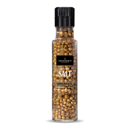 Golden coarse salt crystals in clear glass bottle with black cap, premium seasoning.