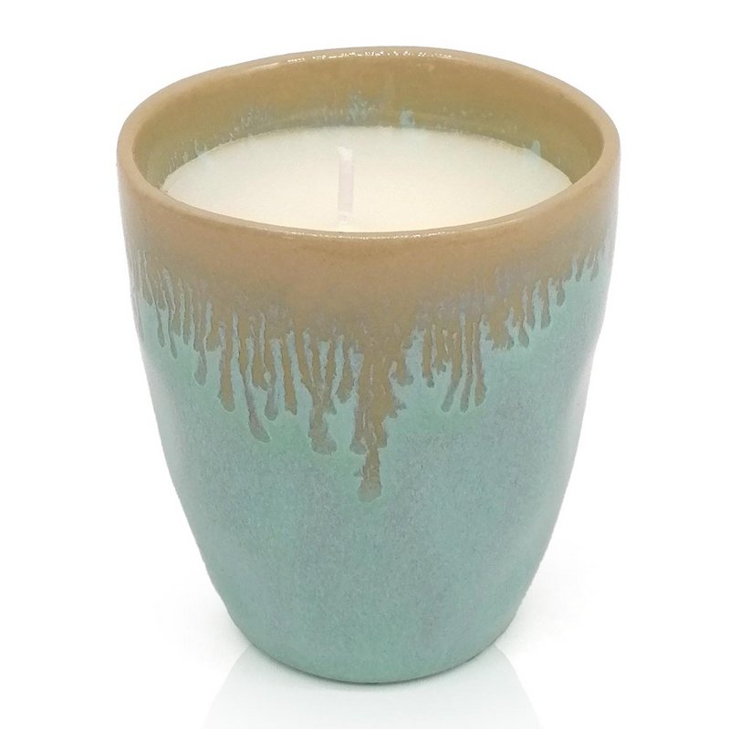 Stoneware candle in a turquoise espresso cup