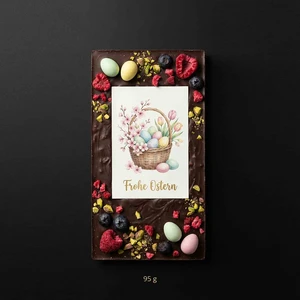 Milk chocolate Easter basket, raspberries, pistachios, currants, eggs.