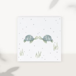  A white square photo album with the text "Baptism" printed on the cover. The album appears to be made of high-quality materials and is suitable for storing and displaying baptism photos.