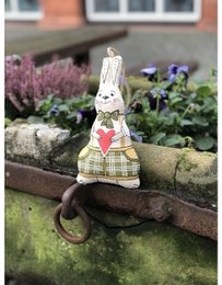 Bunny in bow-tie with a heart