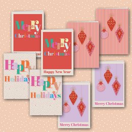 Set of 8 Christmas cards with envelopes featuring festive ornaments and text. Includes a variety of holiday designs in red, pink, and white color schemes.