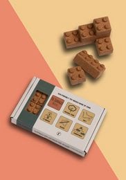 Eco-friendly cork building blocks in a natural, earthy color palette. Suitable for kids' imaginative play.