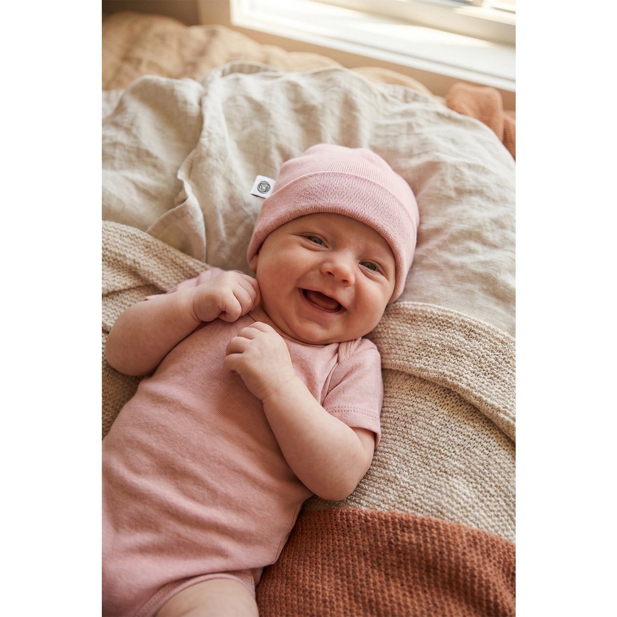 Wollen baby muts - Merinowol - Misty Rose