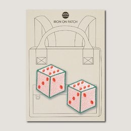 Ironing transfer brooch with two red dice. The brooch features a playful design with two dice, perfect for adding a touch of fun to any outfit.