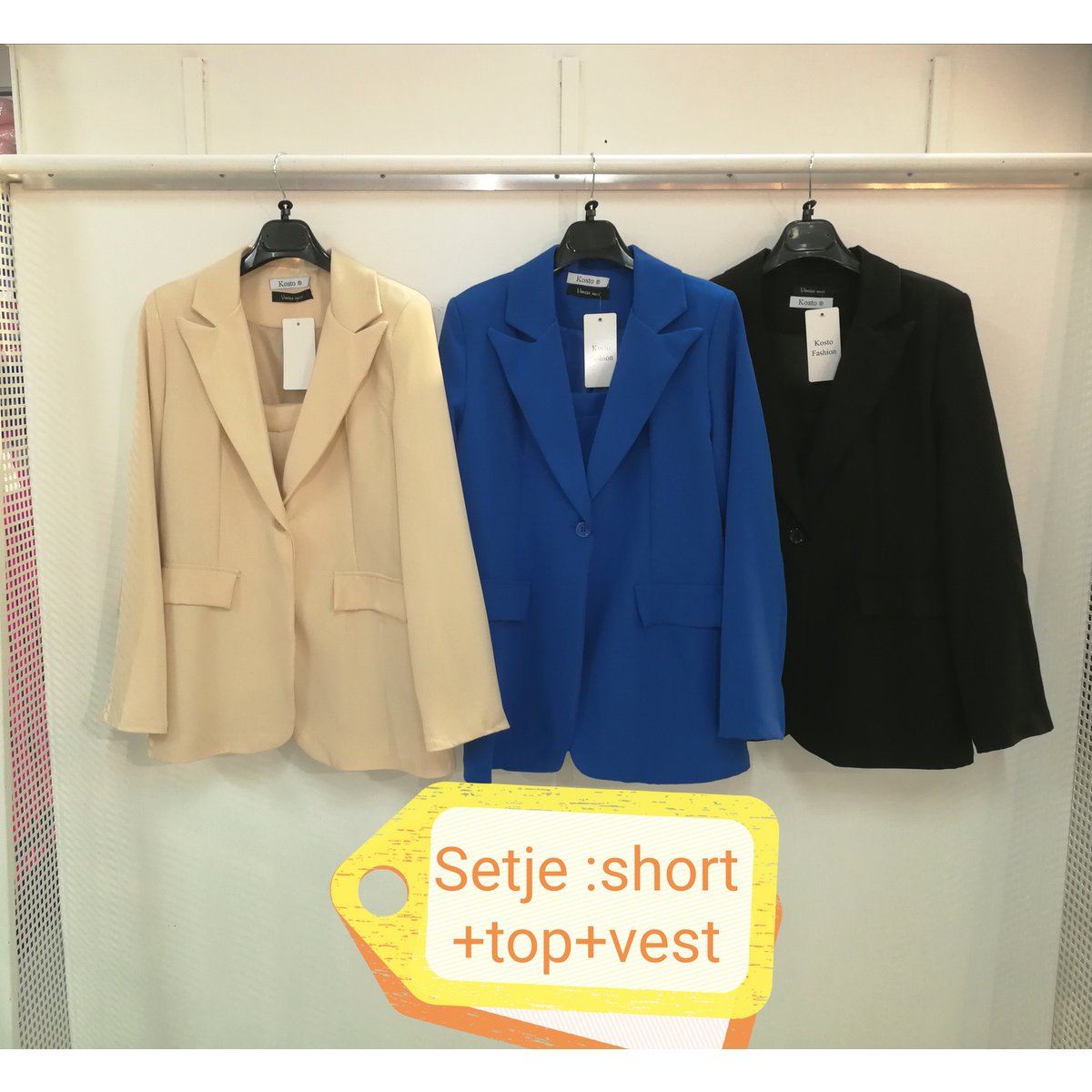 Tuta intera corta con top e giacca per un look business sportivo