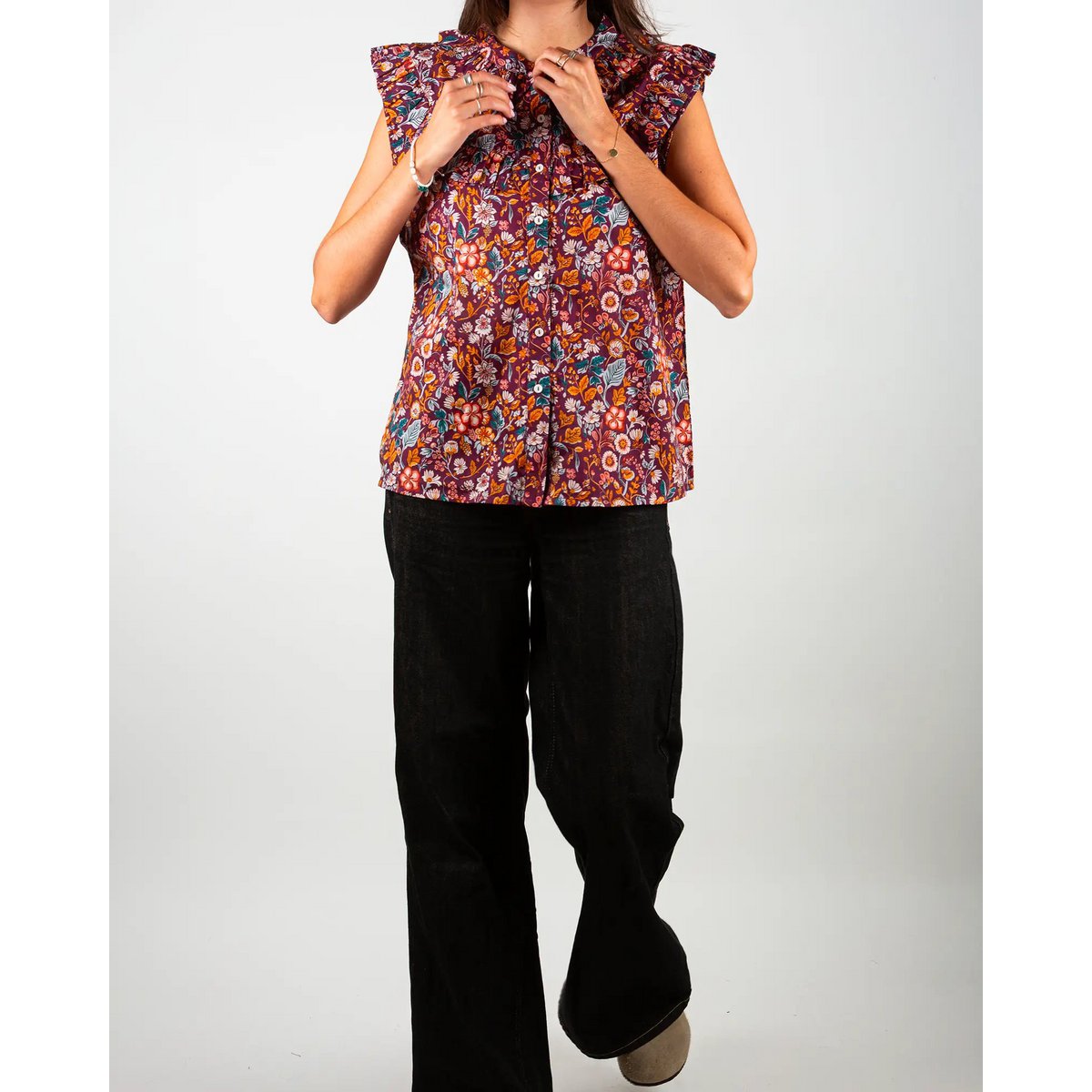 Blusa de mujer morris sin mangas con volantes