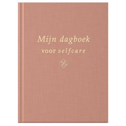 Linen camel-colored notebook with gold foil text "Mijn dagboek voor selfcare" (My diary for self-care).