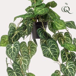 Artificial plant with large, green leaves featuring intricate vein patterns. Hanging plant with trailing stems, suitable for indoor decor.