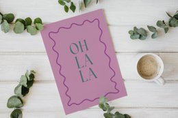 Colorful A4 poster with the text "Oh la la" in a stylized font, framed in a decorative border.