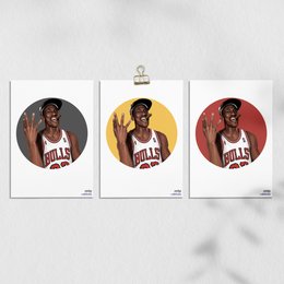 A set of three framed art prints featuring a basketball player wearing a Bulls jersey. The prints showcase the player's portrait in different color schemes - gris (gray), rouge (red), and jaune (yellow).