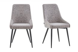 Set of 2 upholstered dining chairs in a neutral gray fabric with black metal legs.