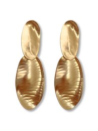 Mees gold-colored statement earrings, featuring a bold, elongated oval shape with a textured, shimmering surface. These earrings add a touch of glamour and sophistication to any outfit.