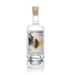 Navy craft gin in a clear glass bottle with a cork stopper. The bottle features a label with a vintage-style design.