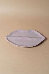 Sisi -plaat, lippen lila