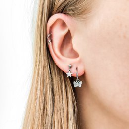 Stud earrings with charm star