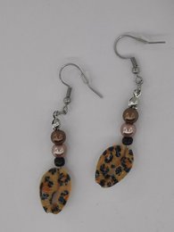 %2364 OW Cowry panther shell earrings