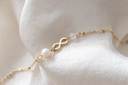 Infinity & Parel Armband - Goud