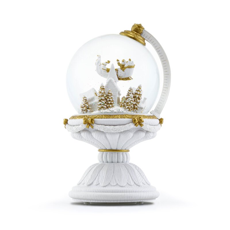 Die kugelförmige Weihnachtsschneekugel mit automatischem Schneesturm und Lichtern.