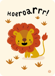 A cute, cartoon-style illustration of a lion with the text "Hoeroarrr!" The lion has a friendly, playful expression and is surrounded by leaves or foliage, suggesting a jungle or nature theme. This image would be suitable for a birthday card or other nature-themed product.