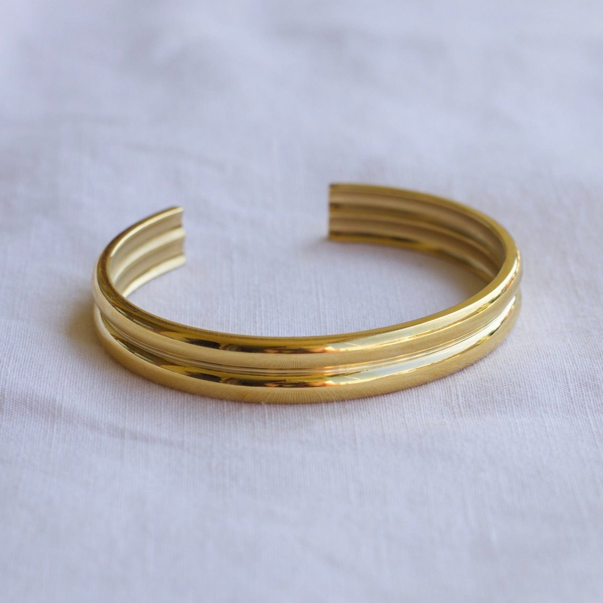 Gil - Bracciale a polsino largo lucido Oro