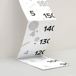 A growth chart with numbers and markings, suitable for a child's room.