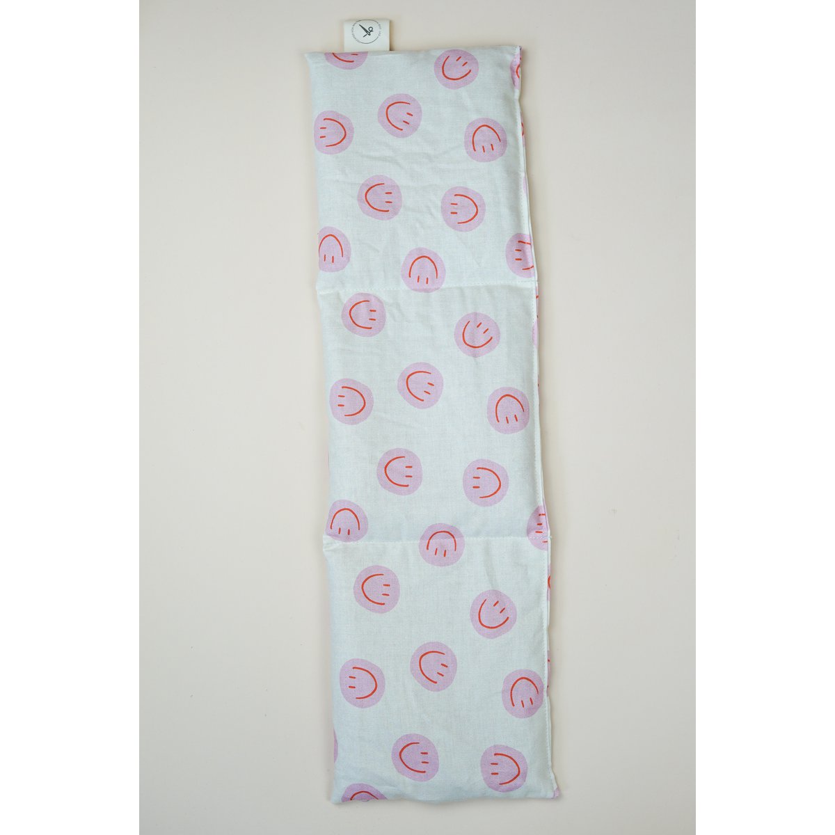 Katoenen warmtekussen gevuld met biologische spelt Smiley Pink