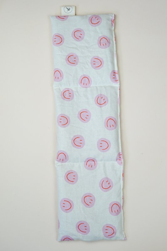 Katoenen warmtekussen gevuld met biologische spelt Smiley Pink