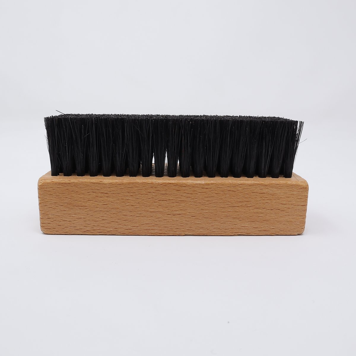 Sneaker brush with dark bristles
