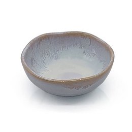 A round, shallow stoneware bowl in a polar white color with a textured, glazed finish.