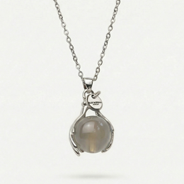 Silver necklace with grey moonstone pendant and intuition charm.