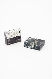 Handmade charcoal soap bar with a black and white speckled pattern.