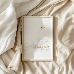  A framed art print featuring a family of geese in a pastoral scene. The print has a soft, neutral color palette and a whimsical, illustrated style that would be suitable for a child's room or nursery.