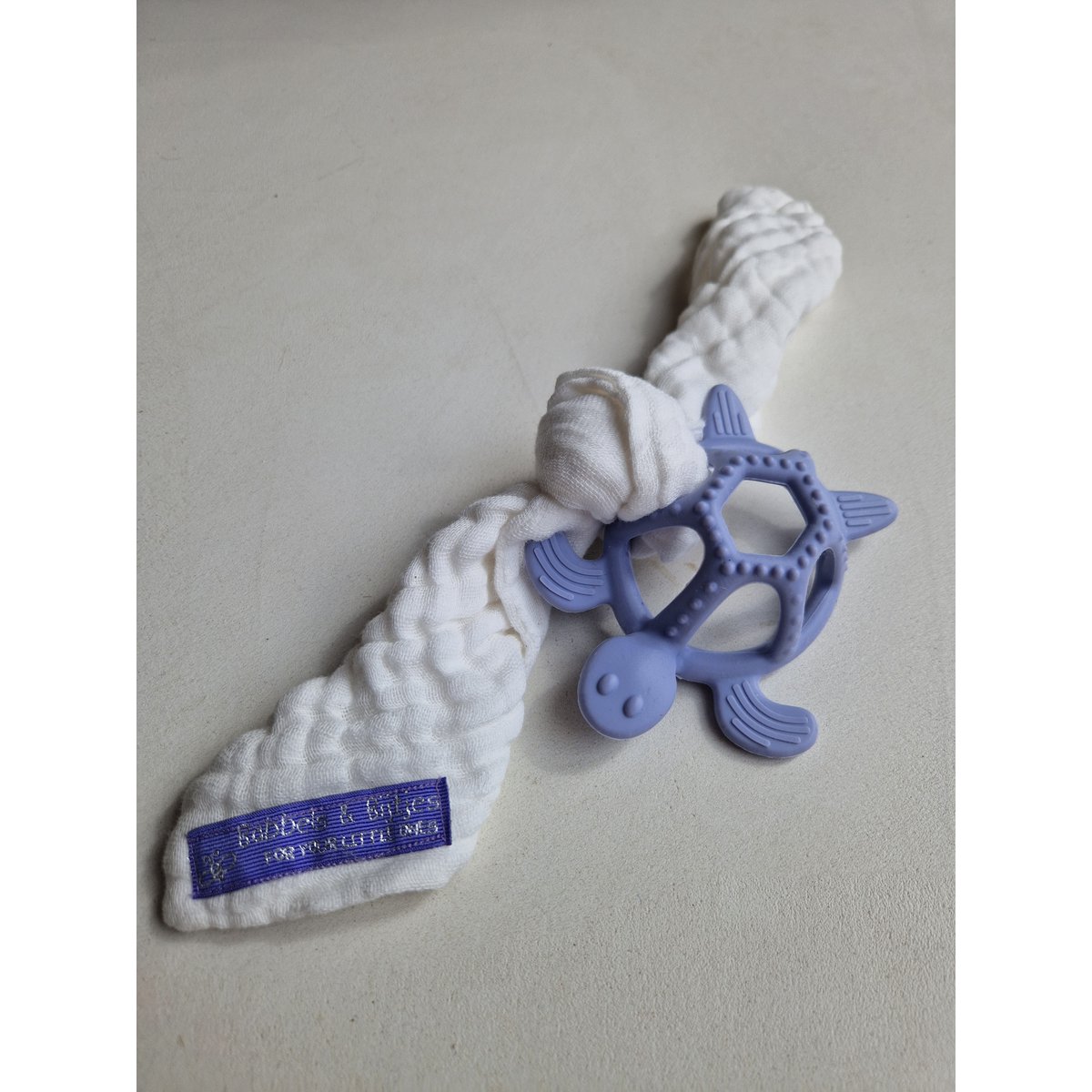 Mordedor tortuga azul con paño blanco