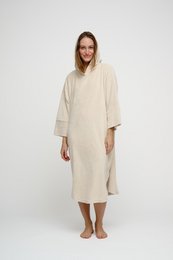 Beige terry cloth poncho robe, hooded, three-quarter sleeves, cozy bath cover-up, soft material.