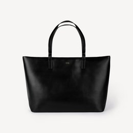 Black vegan leather tote bag with simple, minimalist design. Suitable for everyday use as a shopping bag or work bag.